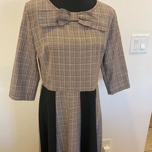 Tan plaid and black dress with a full skirt. NWOT